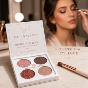 Makeup artist applying Burgundy Rose glitter eyeshadow to model